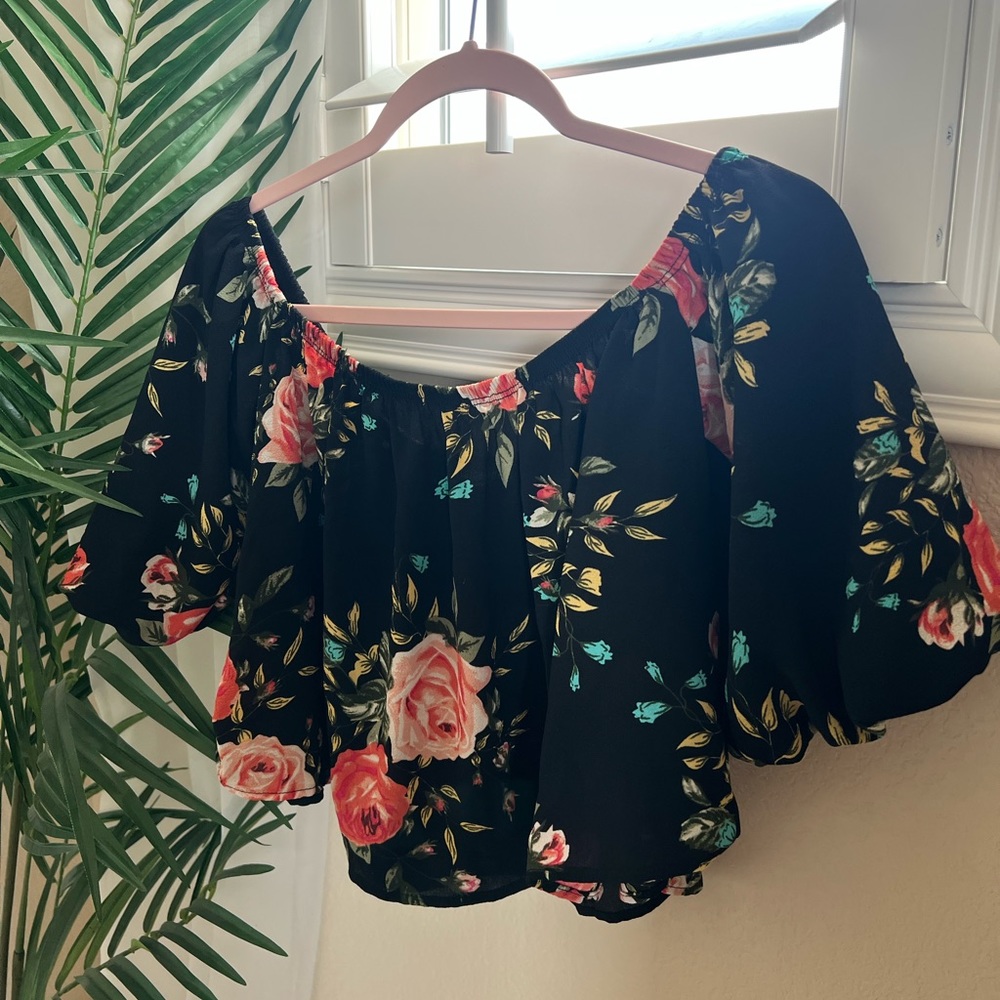 Small black puffball off-shoulder top.